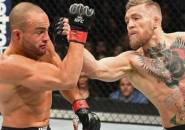 Berita Olahraga: Tumbangkan Eddie Alvarez, Conor McGregor Ciptakan Sejarah di MMA dan UFC