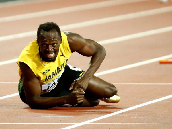 Berita Atletik: Alami Kram di Final Estafet, Usain Bolt Gagal Finis di Lomba Terakhirnya
