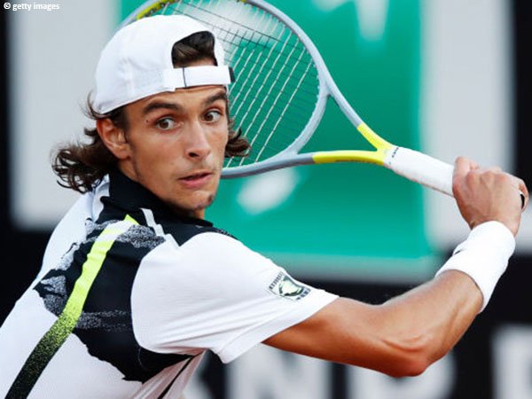 Lorenzo Musetti sangat senang bisa pemanasan dengan Roger Federer di Australian Open 2020