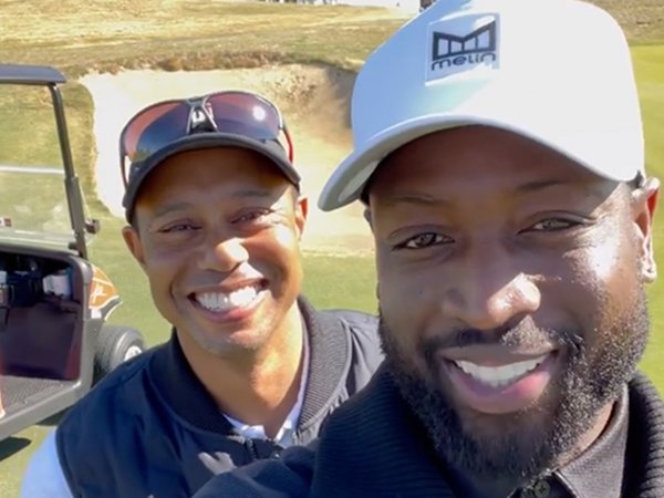 Dwyane Wade main golf bersama Tiger Woods sehari sebelum kecelakaan. (Dwyane Wade / Instagram)