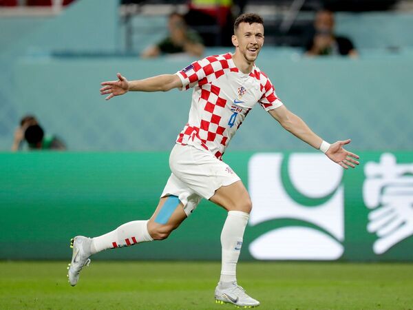 Ivan Perisic berselebrasi saat membela Timnas Kroasia di ajang Piala Dunia 2022 Qatar / via Getty Images