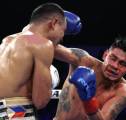 Hanya Delapan Ronde, Emanuel Navarrete Menang Angka Atas Charly Suarez